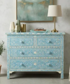 Bone inlay floral design 4 drawer light blue chest of drawer / dresser set in living room with lamp and decor items