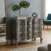 Black mother of pearl inlay fronted wave 3 drawer chest placed in modern living room