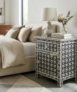 Black Bone Inlay 1 Drawer 1 Door Side Cabinet placed in modern bedroom with pillow and blanket