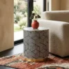 Handmade black bone inlay cube design round side table in modern living room with sofa