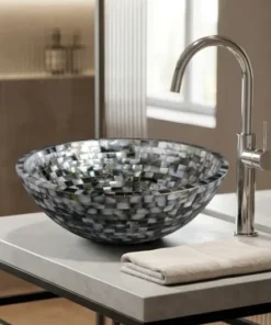 Black Mother of Pearl round hand wash basin with handmade decorative inlay design in modern washroom