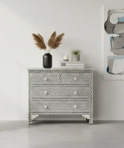 Bone Inlay 4-Drawer Hexagon Chest of Drawer in Grey color in grey room with wall frame and decor items