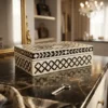 Black and white bone inlay jewellery storage box in luxury vanity room