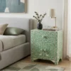 Bone inlay green bedside table with 1 drawer 2 door placed in modern bedroom