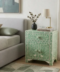 Bone inlay green bedside table with 1 drawer 2 door placed in modern bedroom