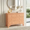 Bone inlay zigzag pattern chest of 4 drawers in luxury modern living room with round mirror and decor items