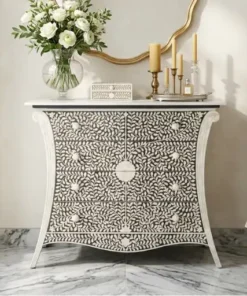 Embossed Bone Inlay Floral 4 Drawer Chest in luxury bedroom with wall mirror and candle and decor items