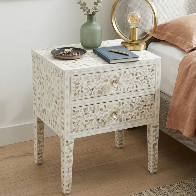 white-mother-of-pearl-nightstand White mother of pearl nightstand with personal items in bedroom