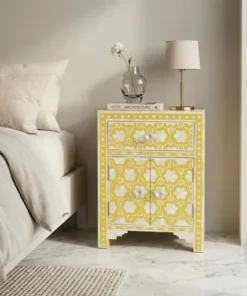 Yellow bone inlay decorative storage bedside table in contemporary bedroom with bed