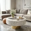 Mother of Pearl Inlay White Floral Round Coffee Table set up in modern living room with white flower vase and sofa set