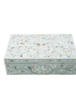 Close up of floral mother of pearl inlay detailing on jewelry box