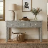 black and white bone inlay 3 drawer console table with home decor items