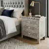 Black Bone Inlay Nightstand Geometric Eye Design placed in bedroom with lemp
