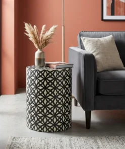 Bone Inlay Black Geometric Design Side Table for modern living room with grey sofa and vase decor.