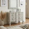 grey bone inlay 2 drawer chest styled in contemporary living room with wall mirror