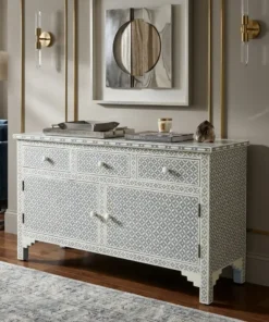 grey bone inlay chest of 3 drawer placed in luxury living room with decor items