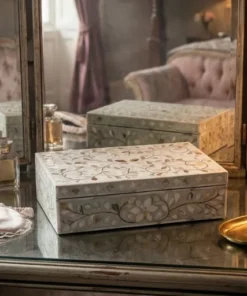 Mother of pearl inlay jewelry box with decorative floral design in luxury dressing table