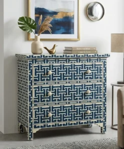 Navy Blue Bone Inlay 3 Drawer Chest placed in modern living room with home decor items and sofa