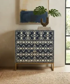 Handmade navy blue bone inlay storage cabinet in modern living room with decor items