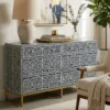 Navy Blue Bone Inlay Chest of 6 Drawers placed in modern living room with chair and décor items