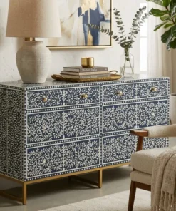 Navy Blue Bone Inlay Chest of 6 Drawers placed in modern living room with chair and décor items