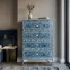 Mother of Pearl Inlay Navy Blue Floral 4 Drawer Tall Dresser Cabinet in modern bedroom with decor items