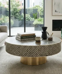 Black bone inlay designer coffee table in modern living room with sofa and decor items