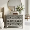 Bone Inlay Iberia Design Black 4 Drawer Chest Dresser in modern bedroom with wall mirror and flower vase