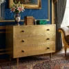 Royal brass 3 drawer chest placed in royal living room