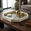 Black and white bone inlay decorative serving tray on brown coffee table