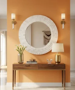 Handmade white bone inlay decorative large wall mirror on sunrise orange modern wall with wood console and decor