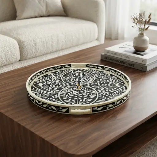 Handmade black bone inlay floral round serving tray on coffee table