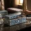 Handmade navy blue bone inlay jewelry storage box on luxury dressing table with jewelry items