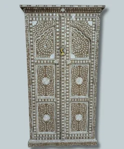 Front view of mother of pearl inlay Mehraab cupboard on plain background
