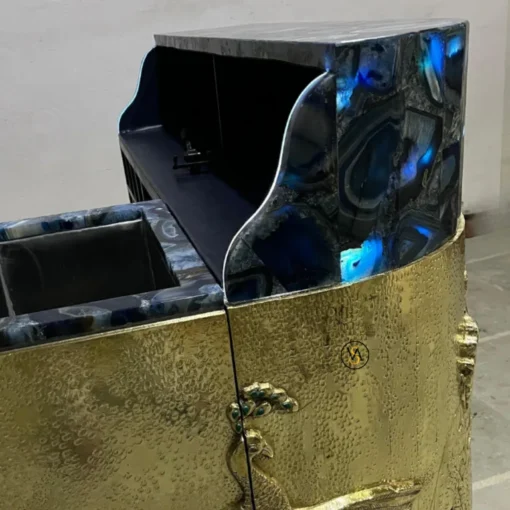 Back view of royal brass peacock embossed bar cabinet with blue agate top and storage compartments