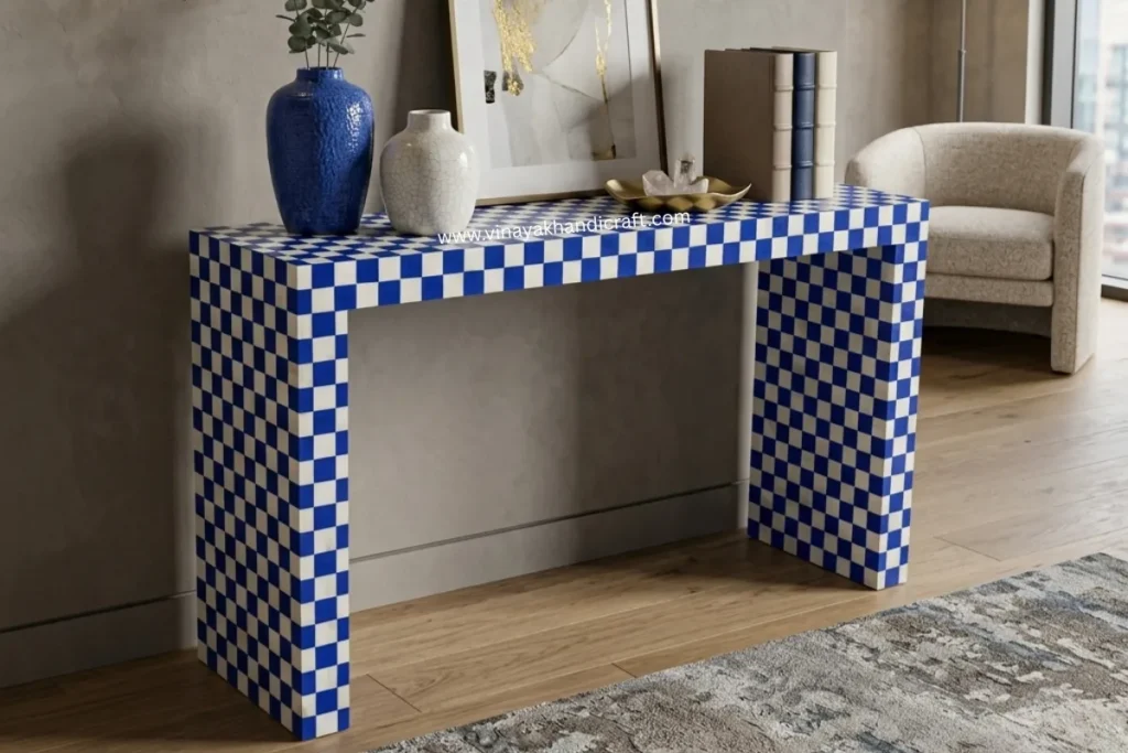 Blue & white bone inlay console table placed in entryway of living room 