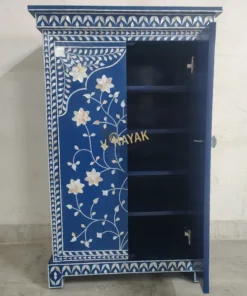 Navy blue mother of pearl shoe cabinet with one door open showing storage shelves