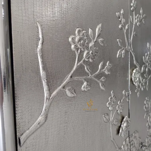 Metal cupboard with rose floral detailing